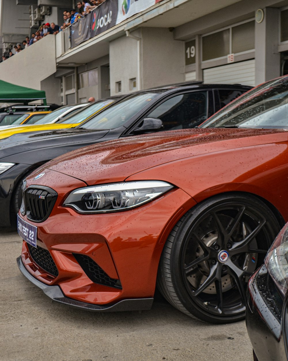 a group of cars parked in a parking lot