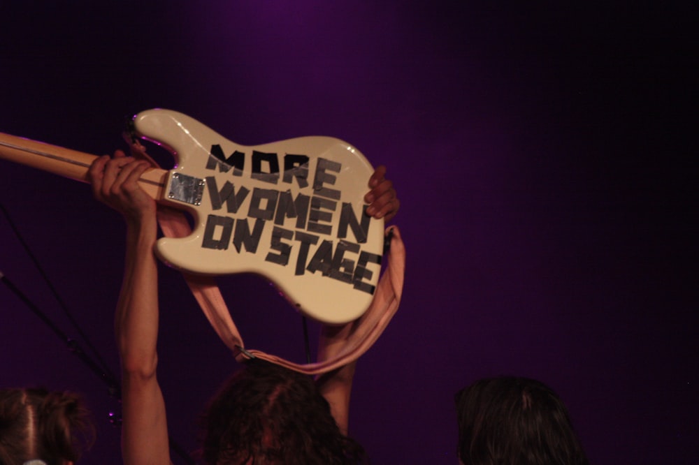 a person holding a sign