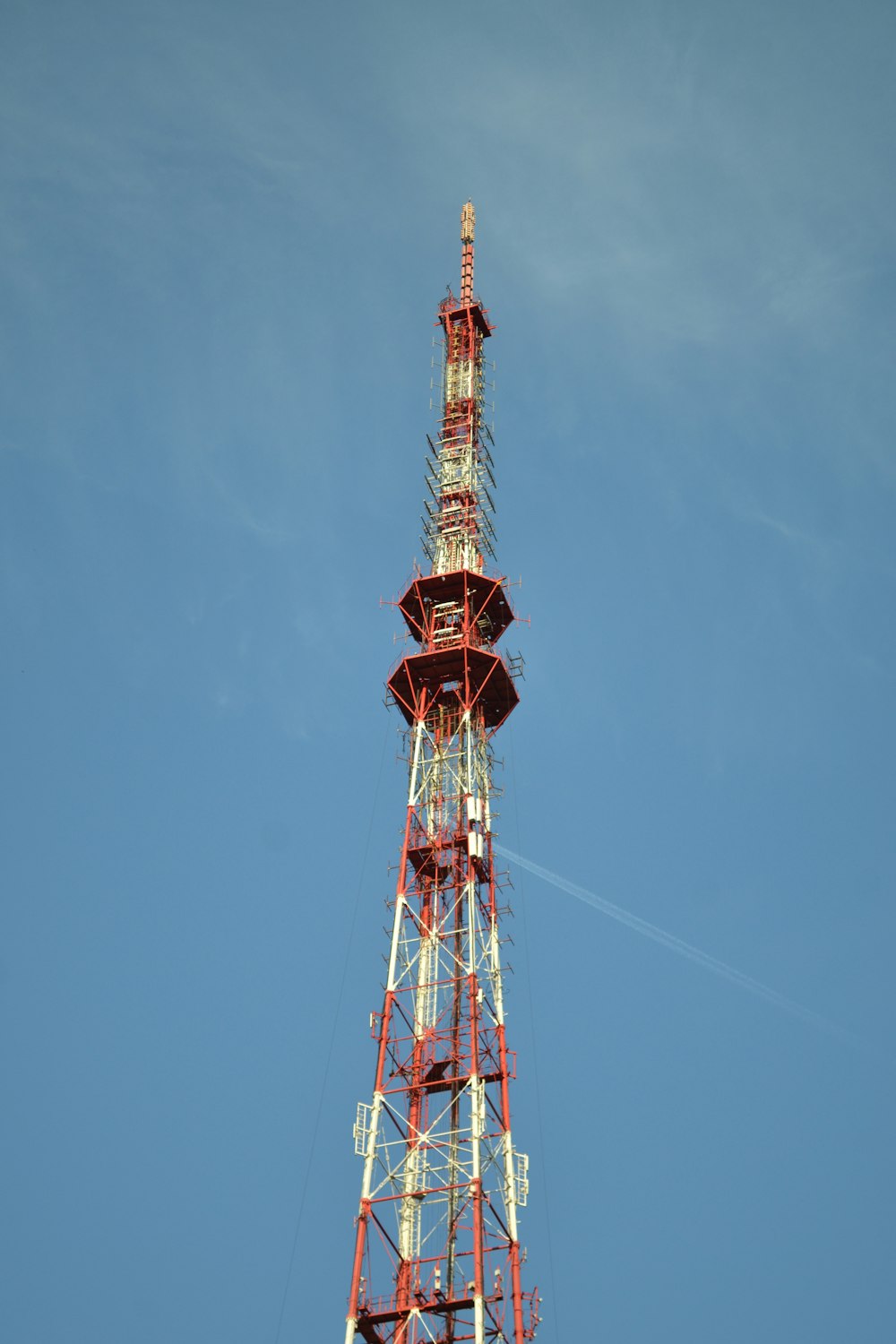 a tall red and white tower