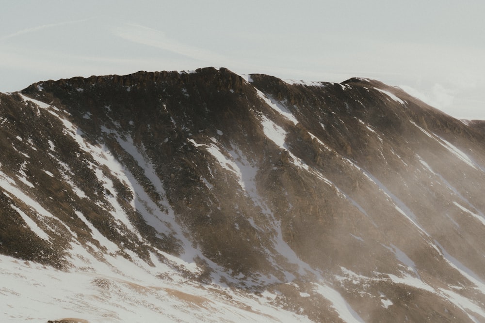 a mountain with snow