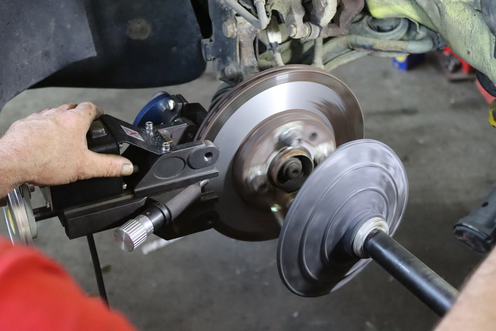 A rotor and hand tool on the workbench