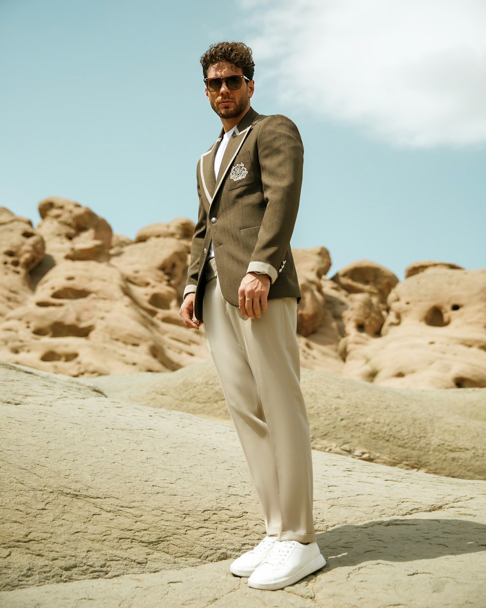 a man standing in a desert