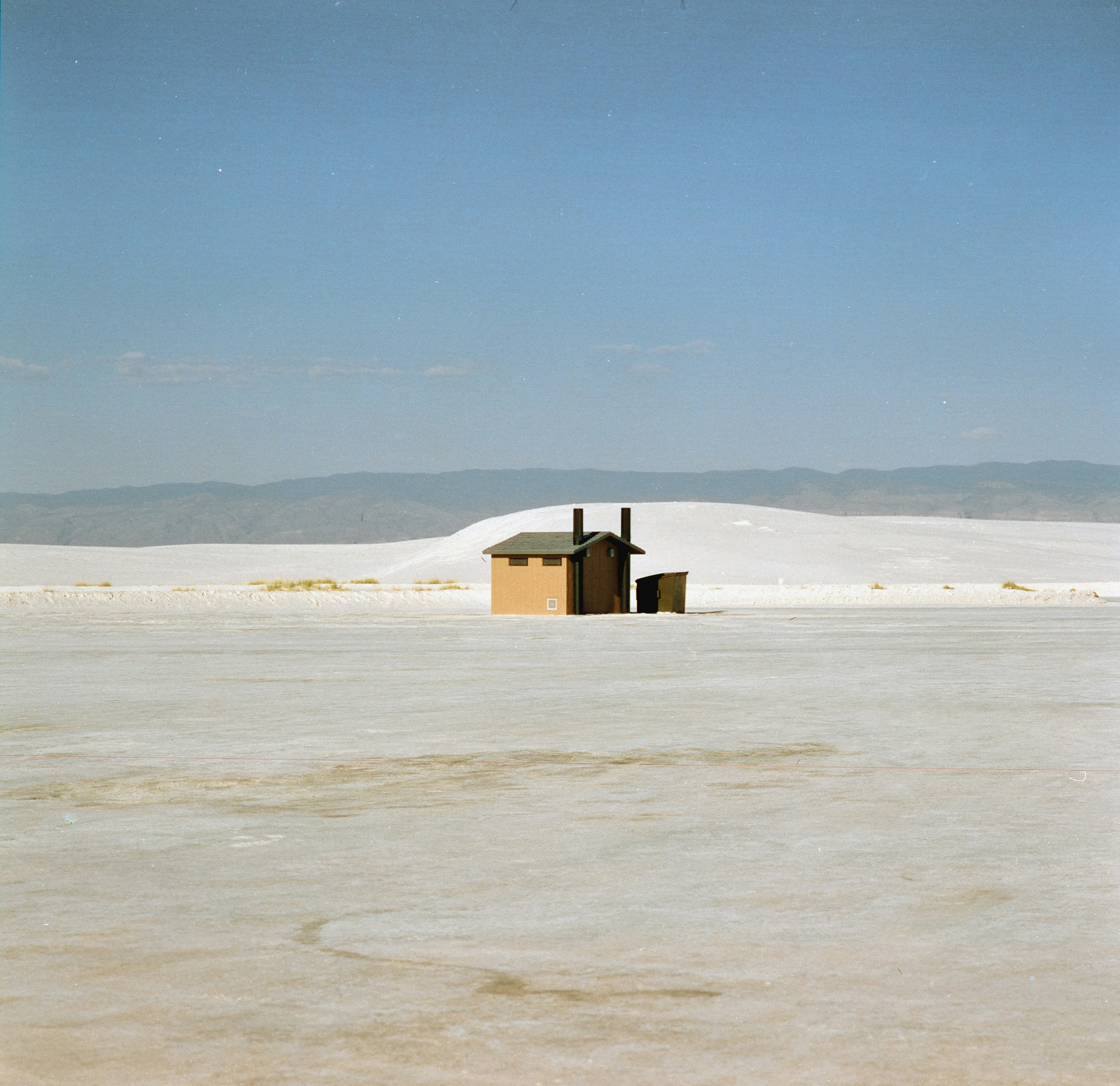 a small building in a desert