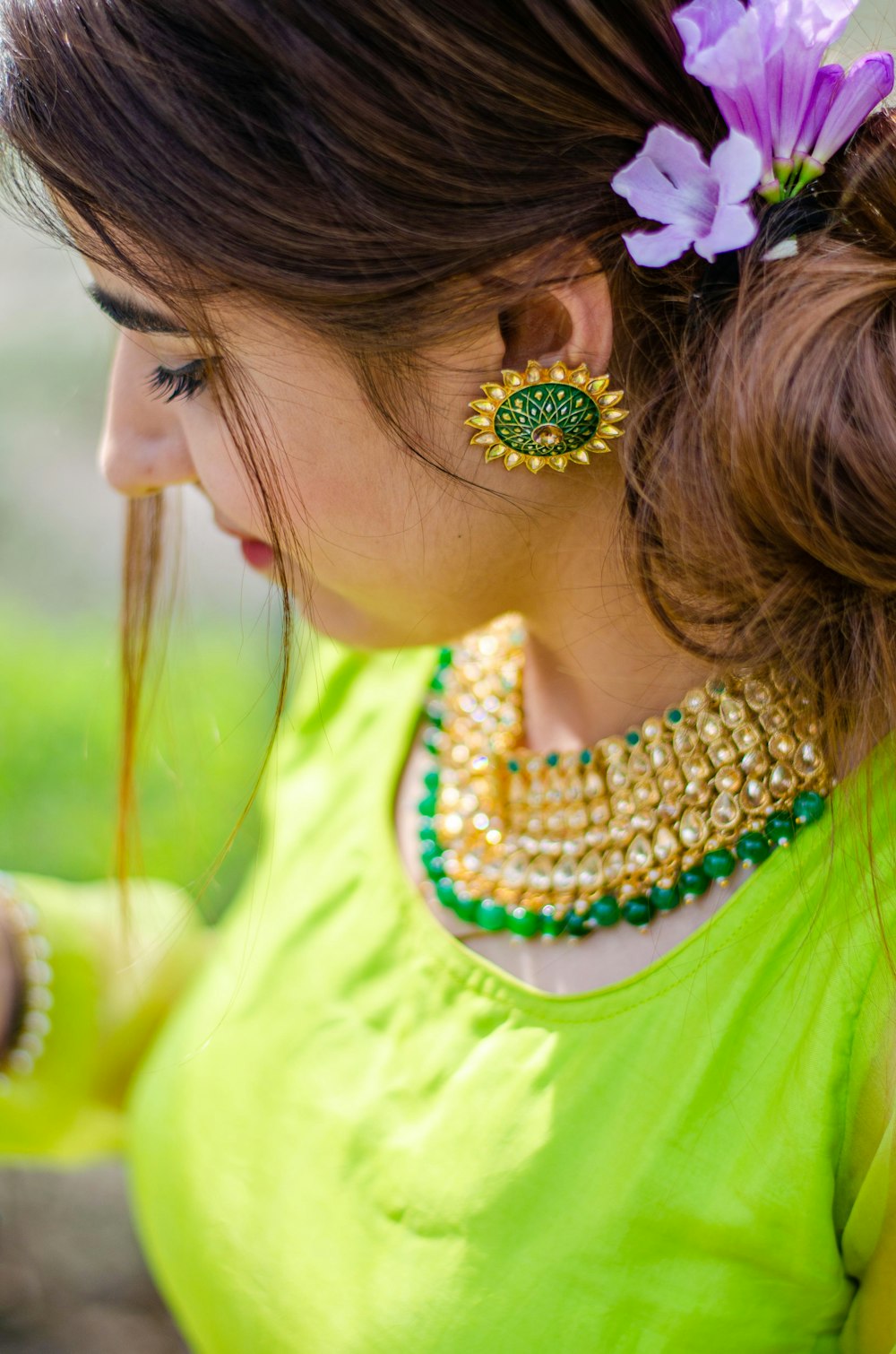 a woman with a flower in her hair