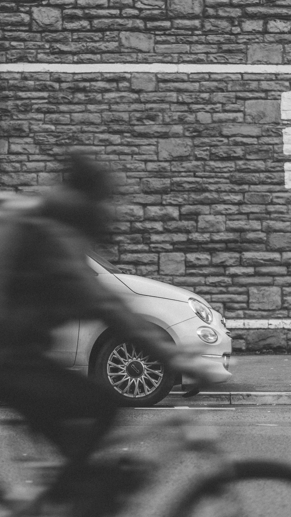 a person standing next to a car