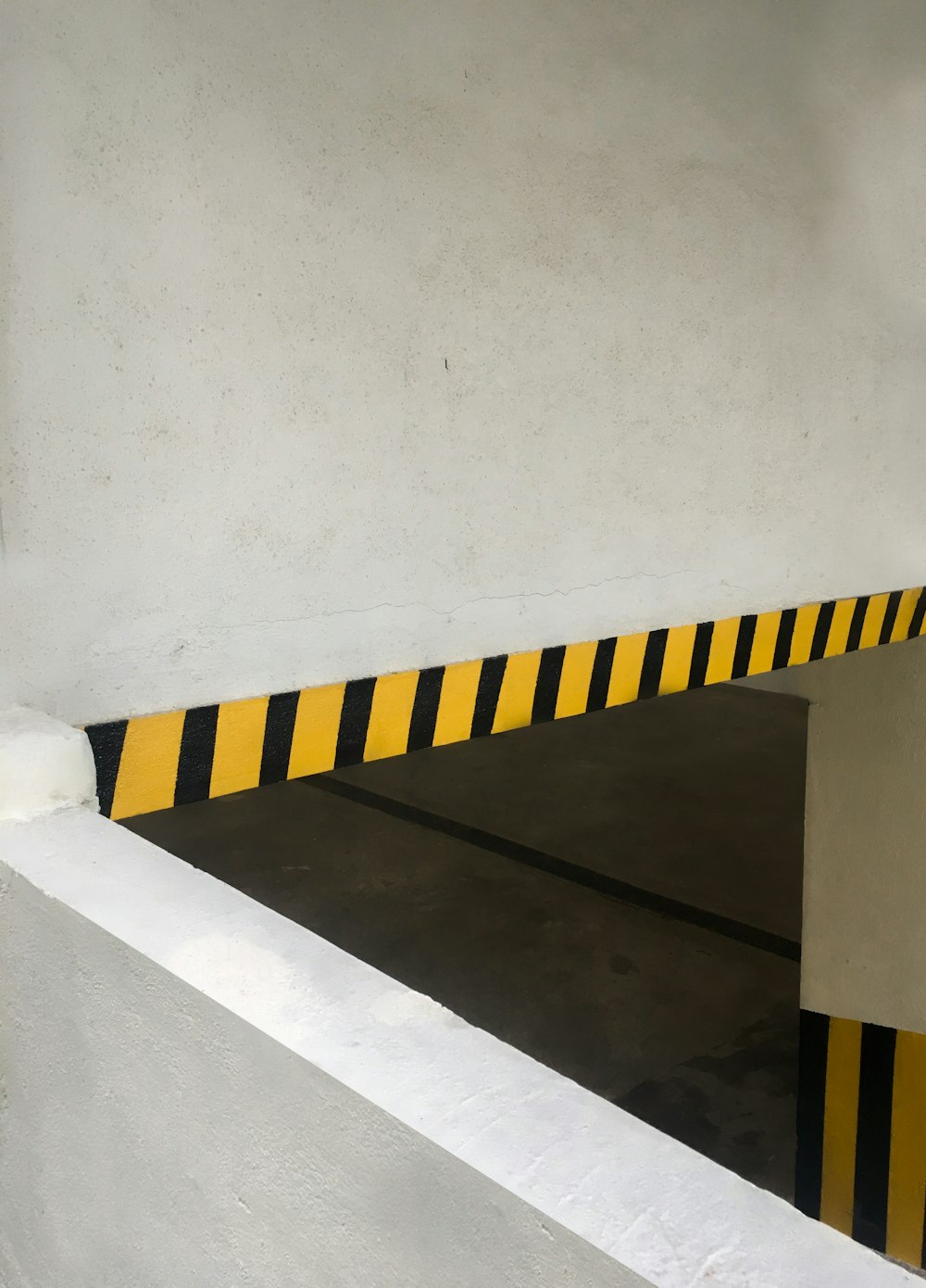 a staircase with yellow and black stripes