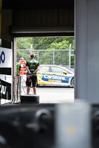 Close-up of a member receiving a special race day gift package at the track.
