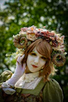 a woman with flowers on her head