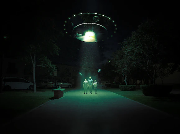 A mysterious glowing UFO hovering over a dark forest at night.