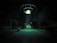 A dark outdoor setting illuminated by a large, glowing UFO hovering above. Three figures stand in its beam of light, surrounded by trees and parked cars. The scene is surreal and otherworldly, with an eerie green hue cast over the landscape.