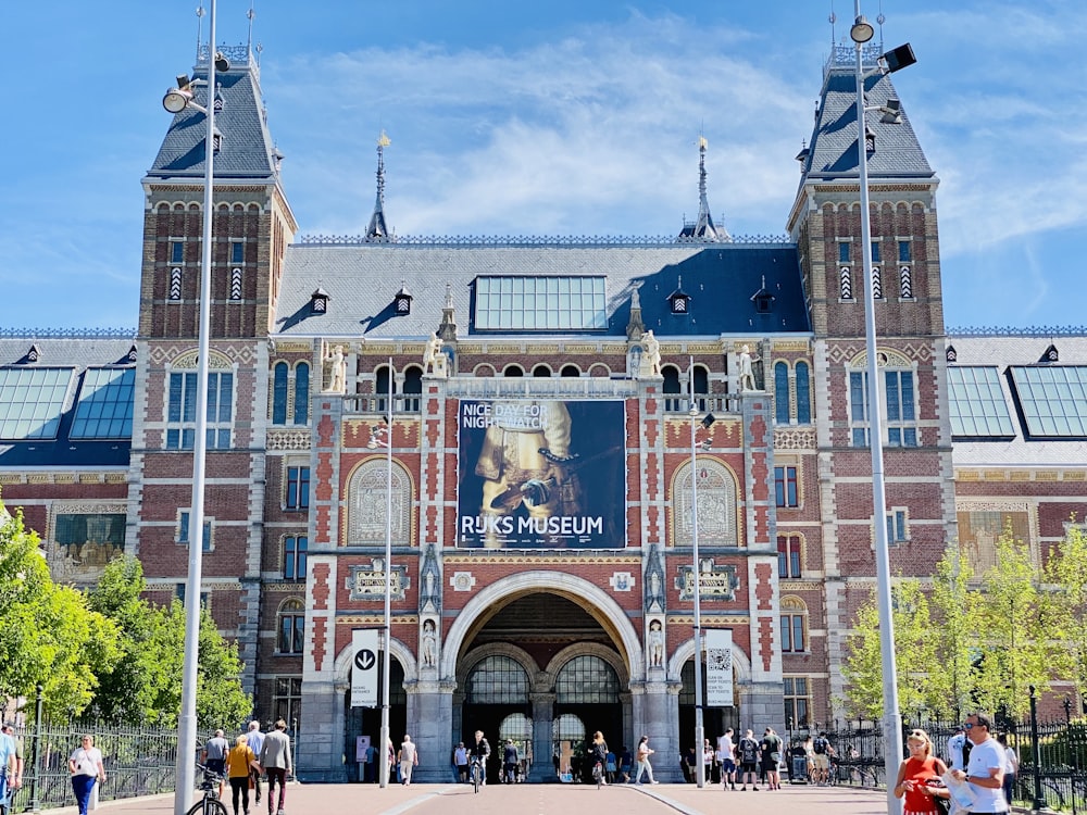 a large building with towers with Rijksmuseum in the background