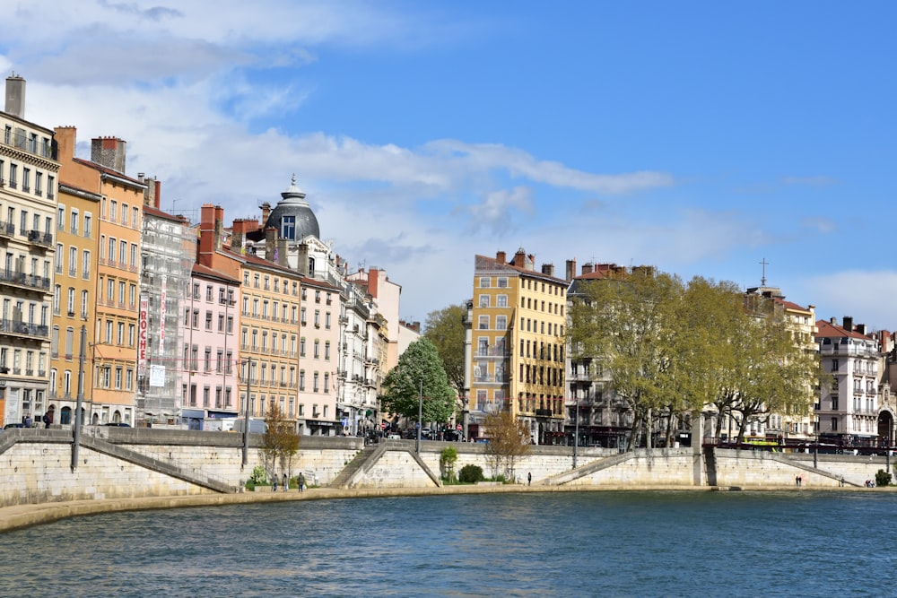 a body of water with buildings along it