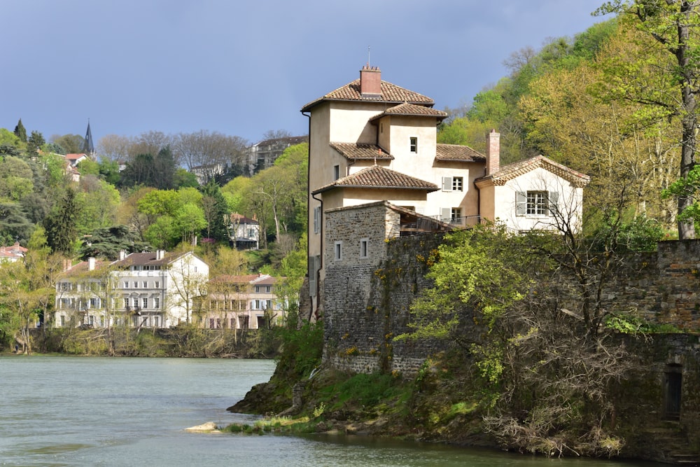 a building on the edge of a river