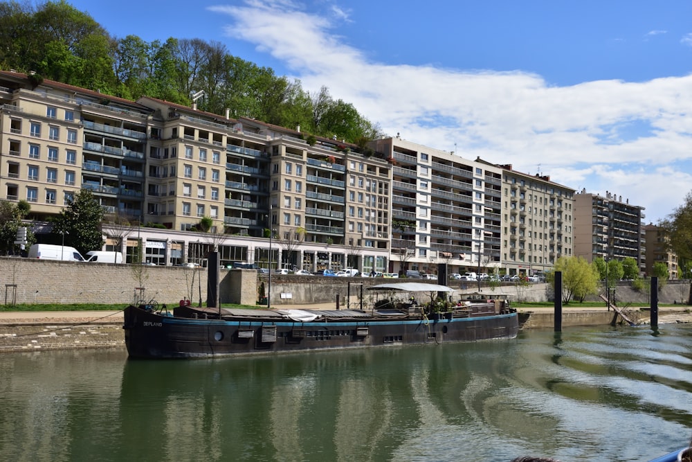 a body of water with buildings along it