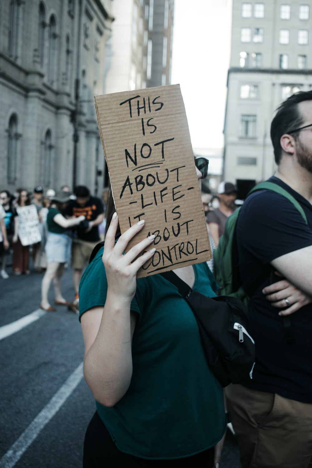 a person holding a sign