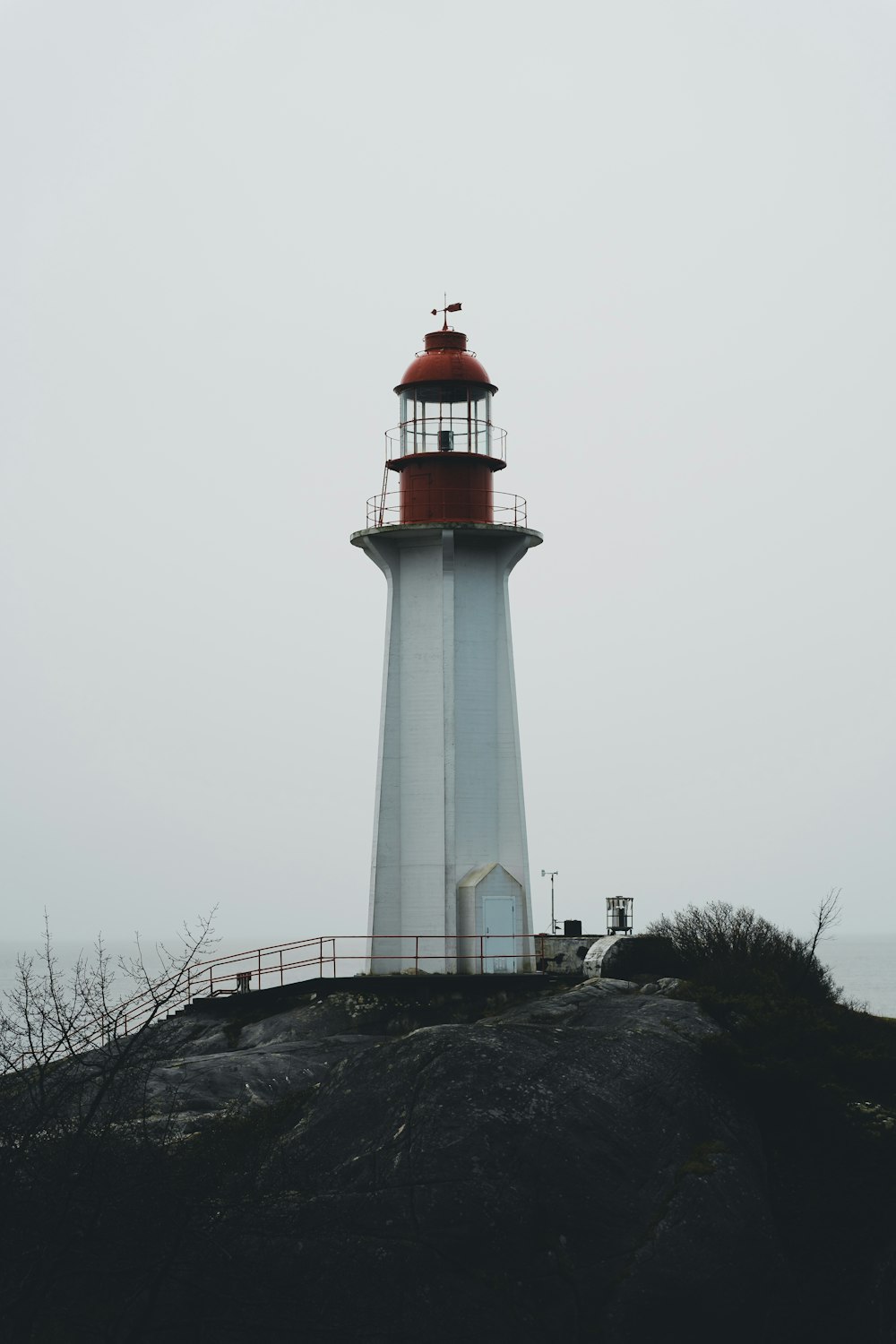 a lighthouse on a hill