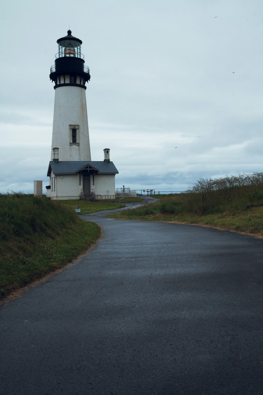 a lighthouse on a hill