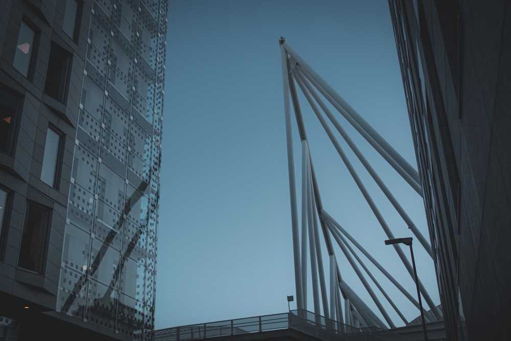 a tall bridge between buildings