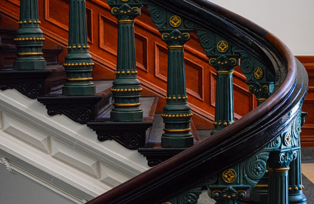 a staircase with colorful pillars