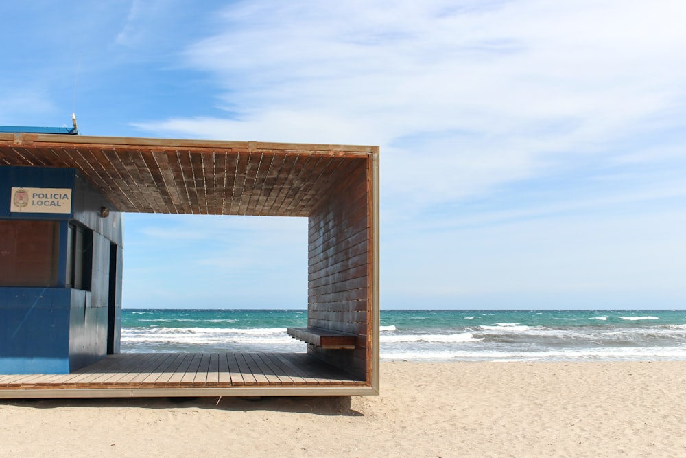 a small shack on a beach