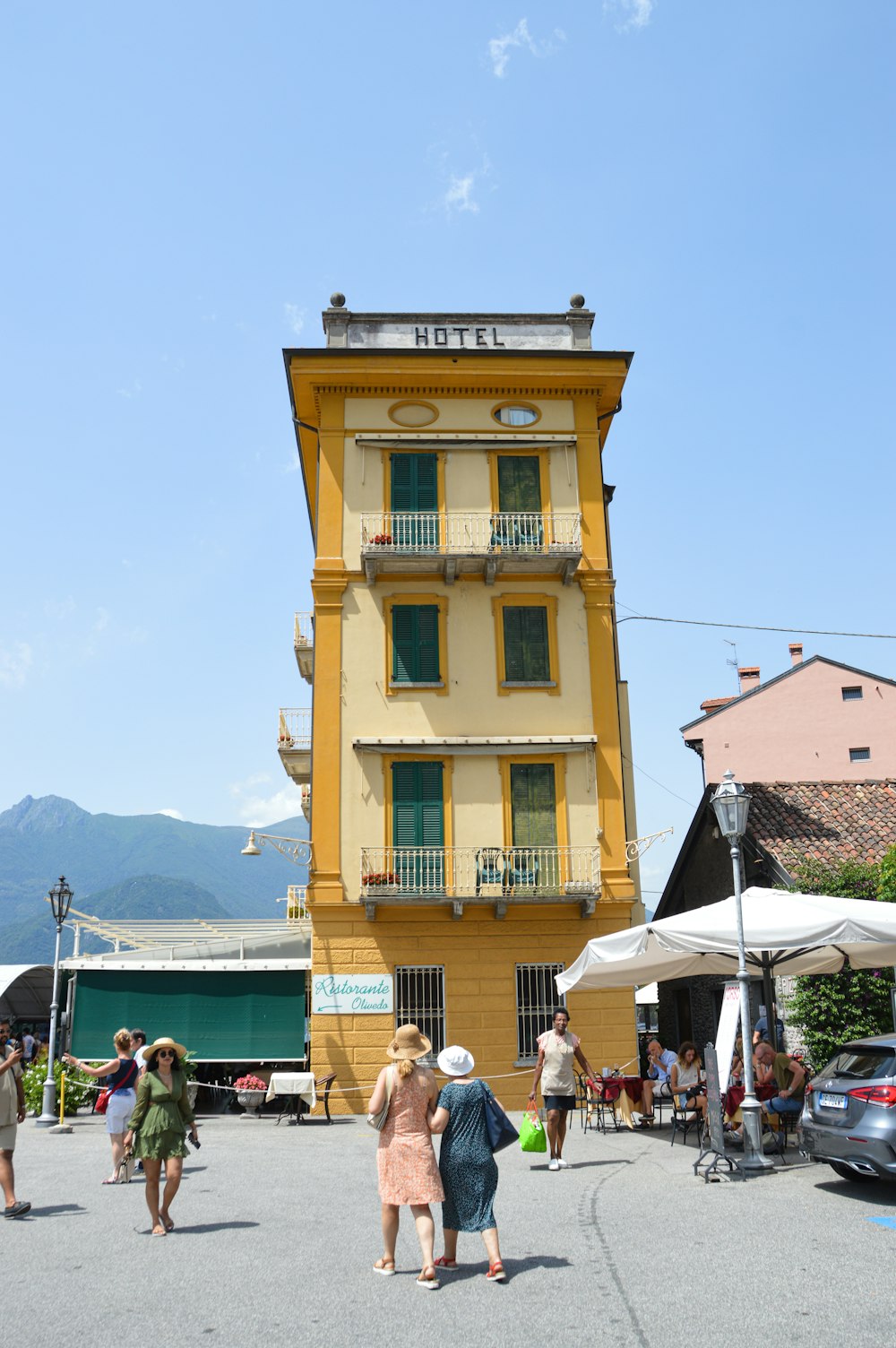 a yellow building with a tower