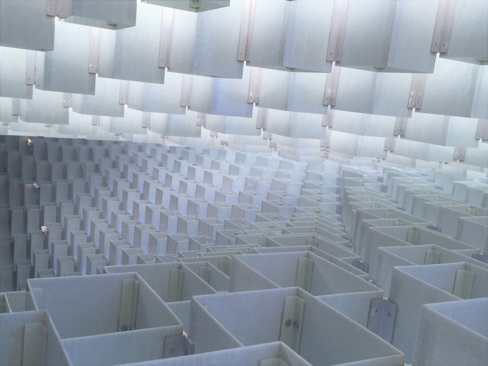 a room with many white boxes