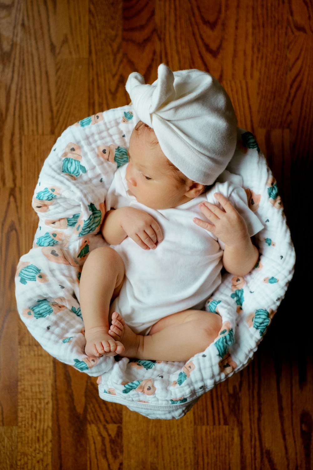 a baby sleeping in a crib