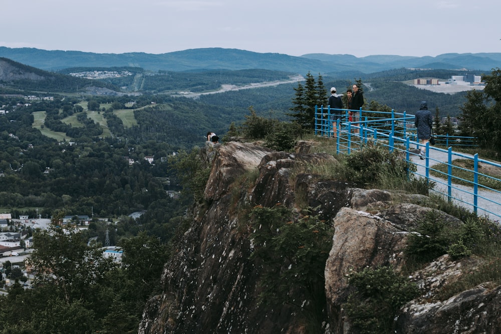 a group of people on a bridge