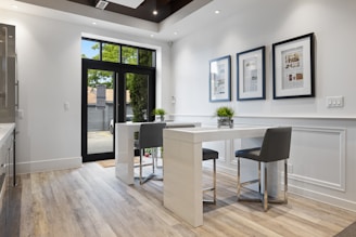 a room with a table and chairs