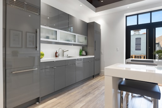 a kitchen with a glass door