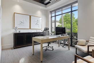 a room with a table and chairs