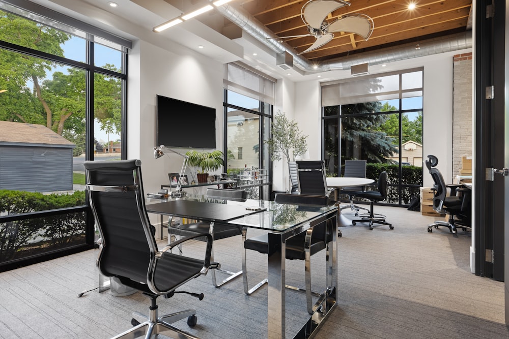 a room with a table and chairs