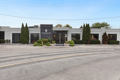 a building with trees in front