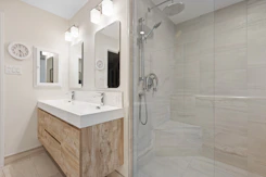 a bathroom with a glass shower