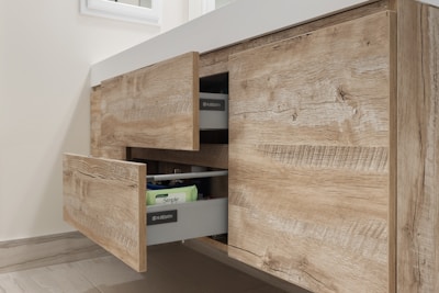 a wooden cabinet with a shelf