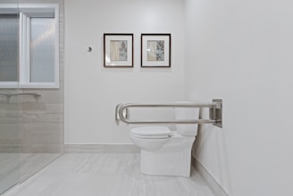 a bathroom with a toilet and a bathtub