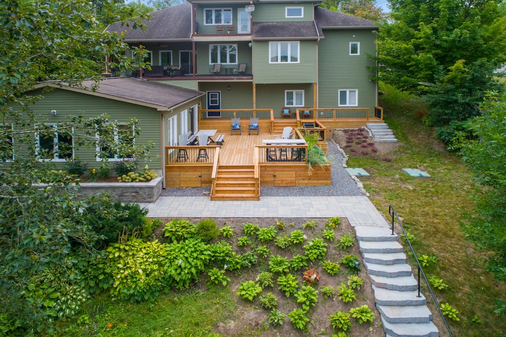 a house with a deck and trees