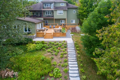 a house with a path and trees