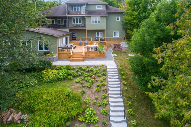 a house with a path and trees