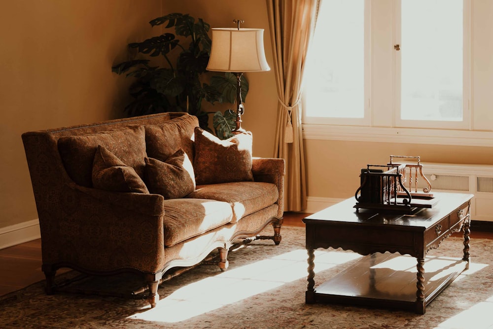 a living room with a couch and coffee table