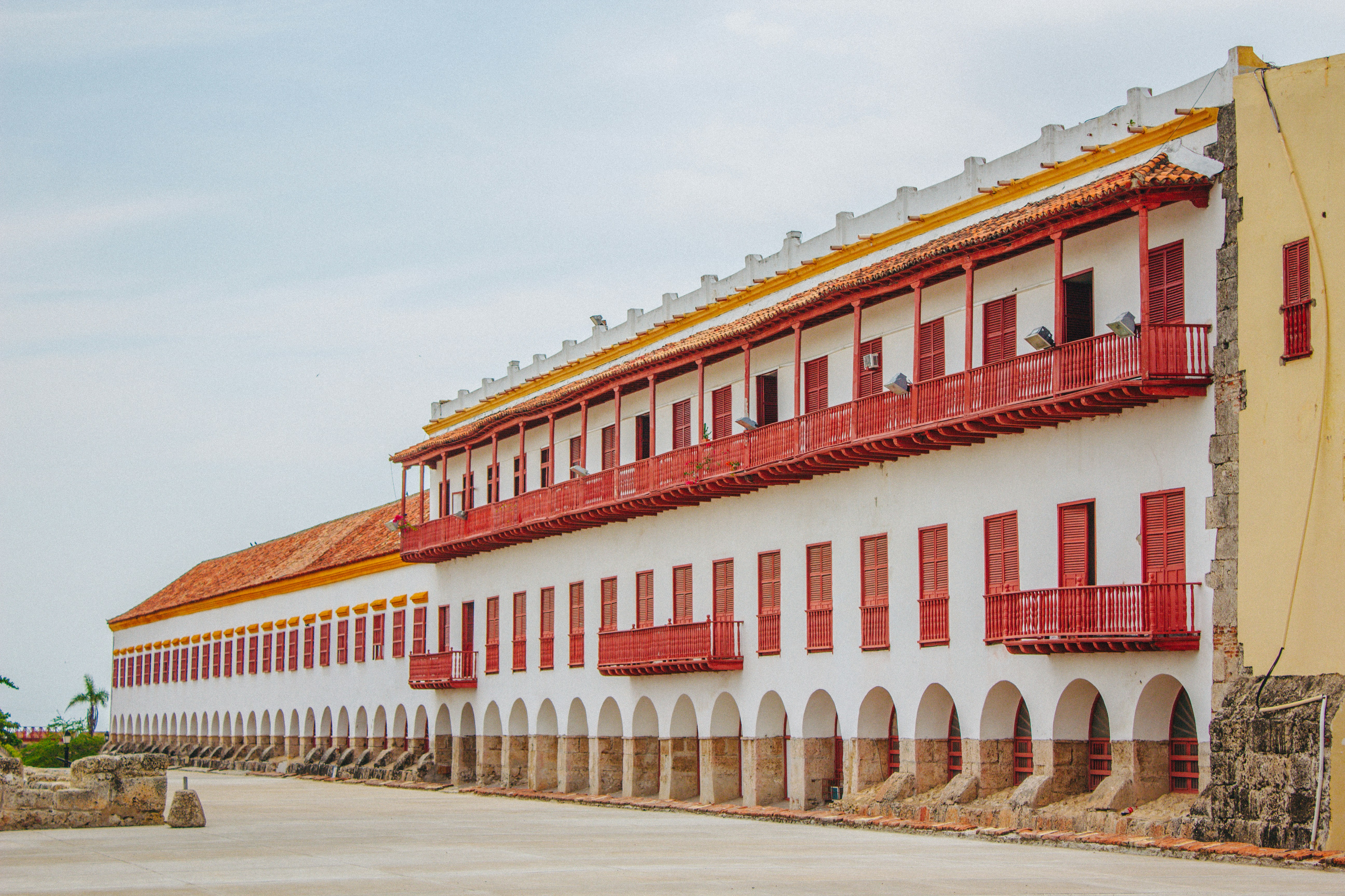 a building with red and white windows, 