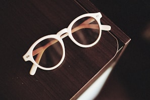 a pair of white glasses