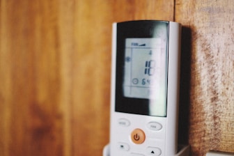 a white handheld game console