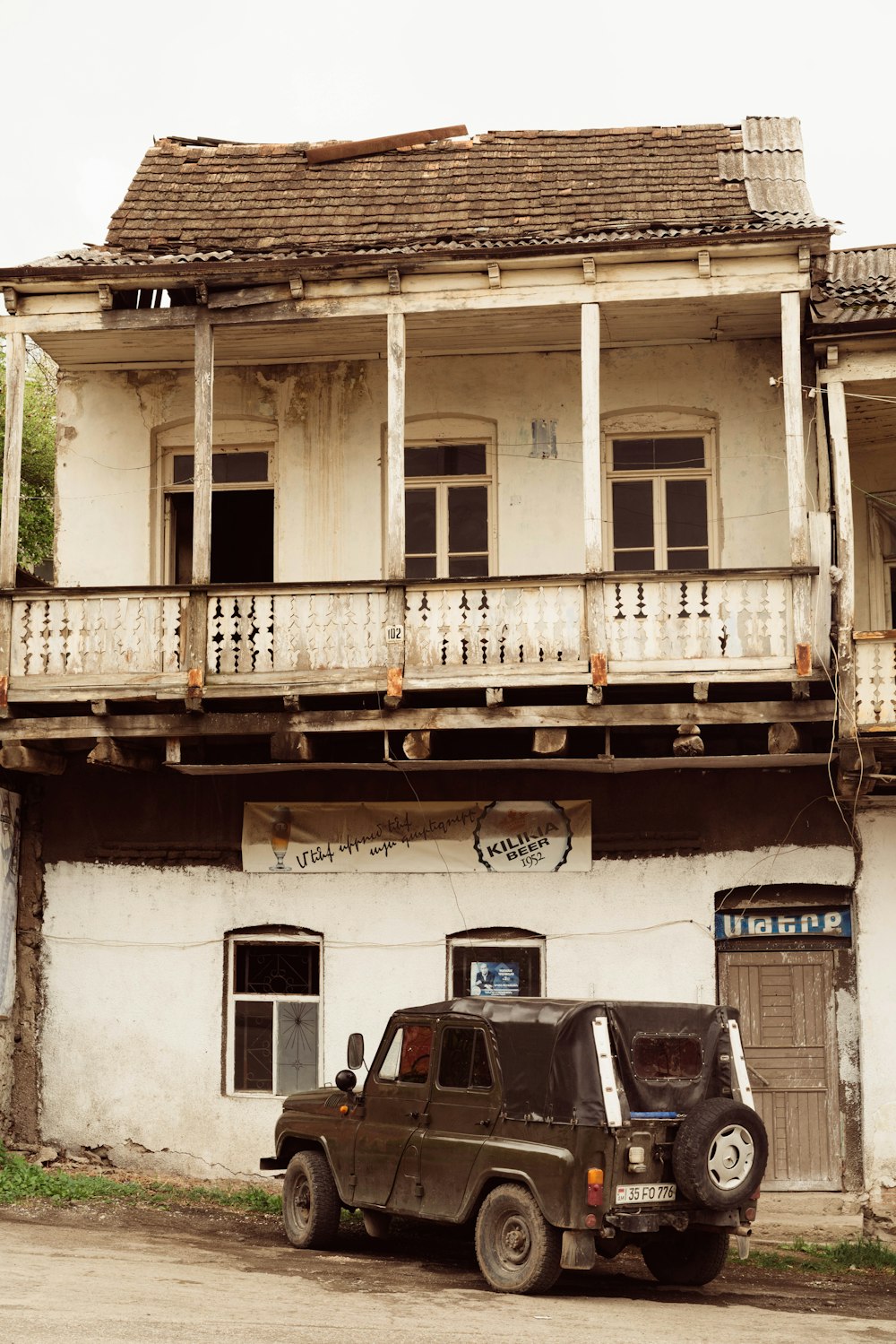 a jeep parked in front of a house