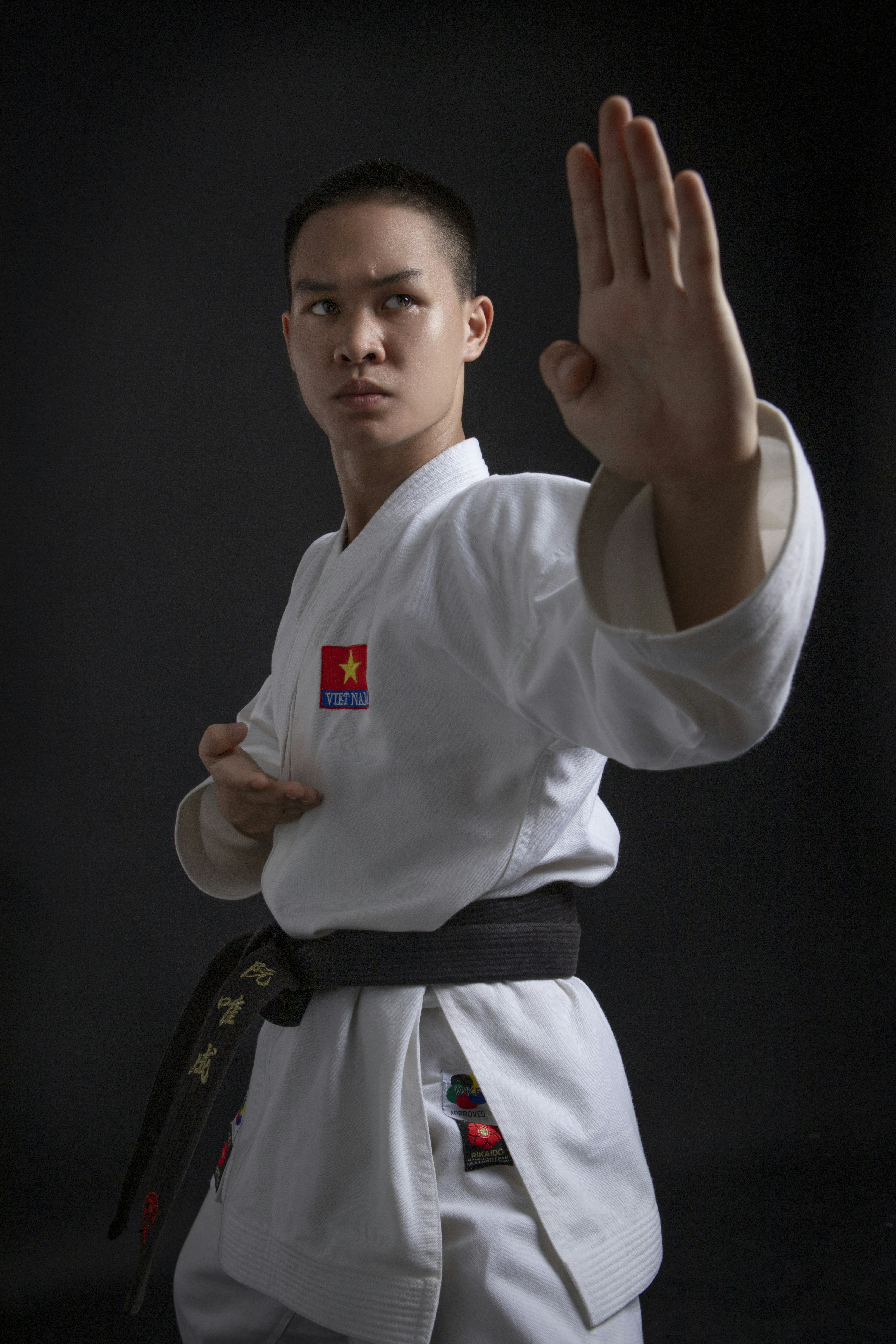 a man in a karate uniform