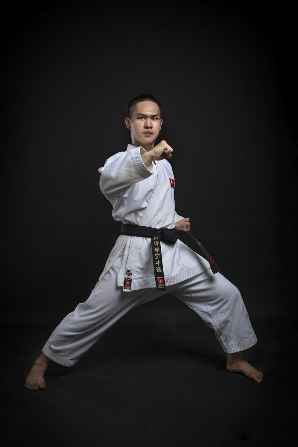 a man in a karate uniform