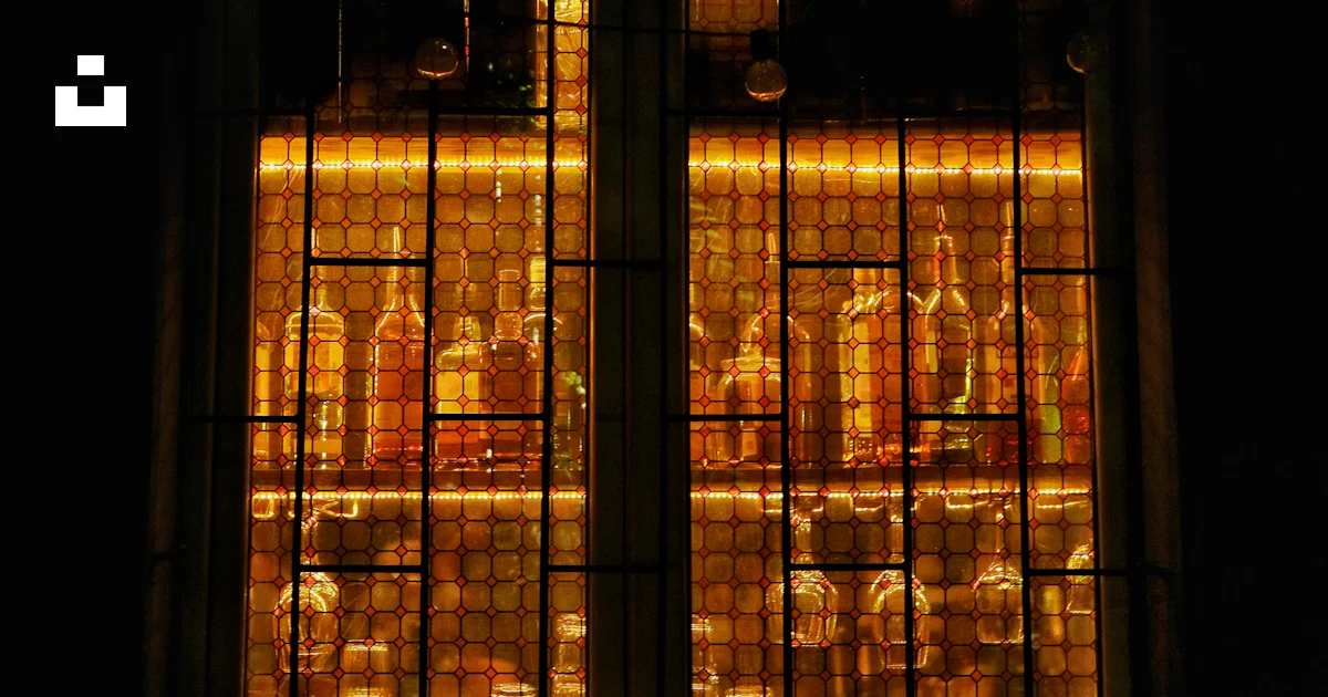 A window with a light inside photo – Free Warm Image on Unsplash