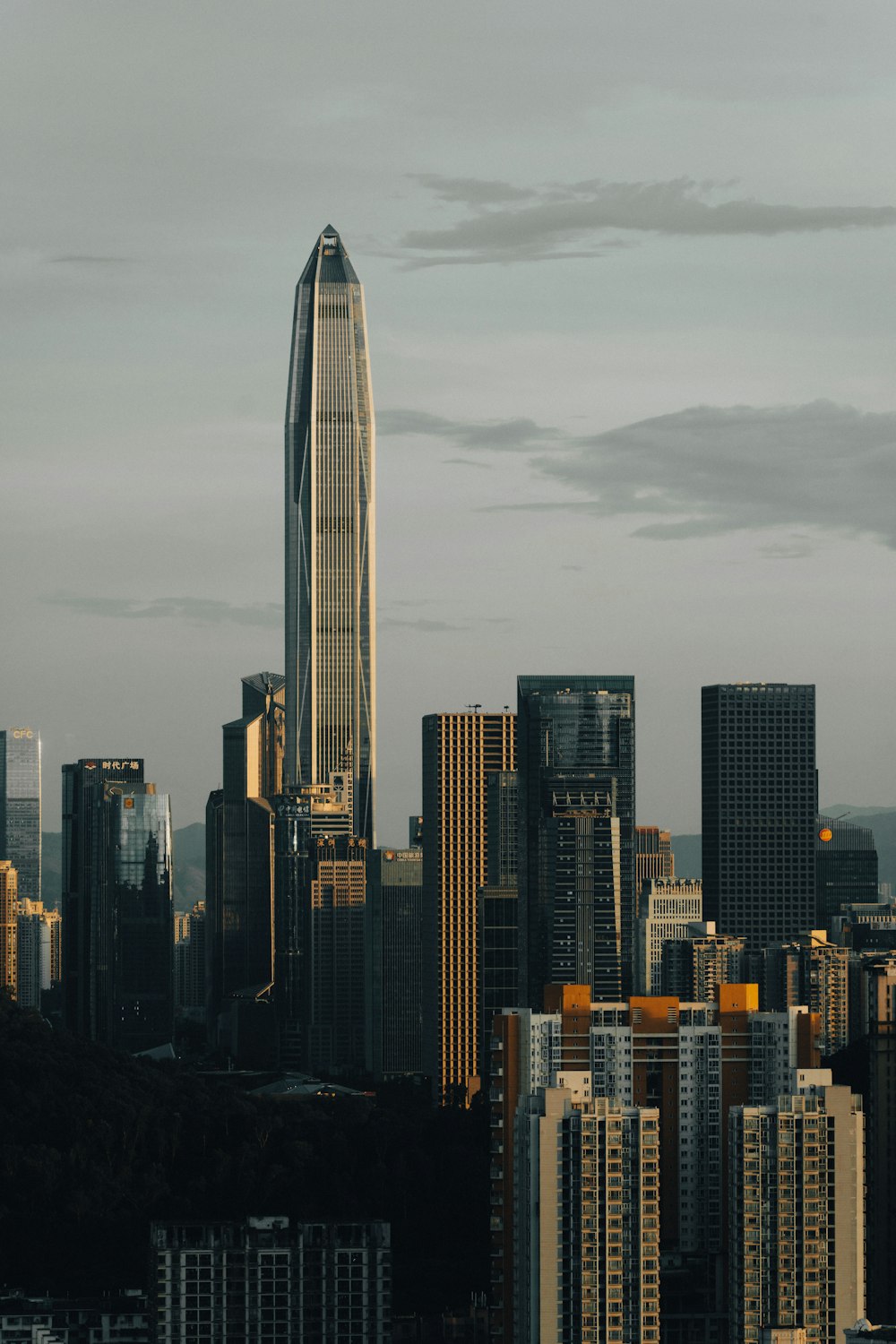 a large city with tall buildings in the background