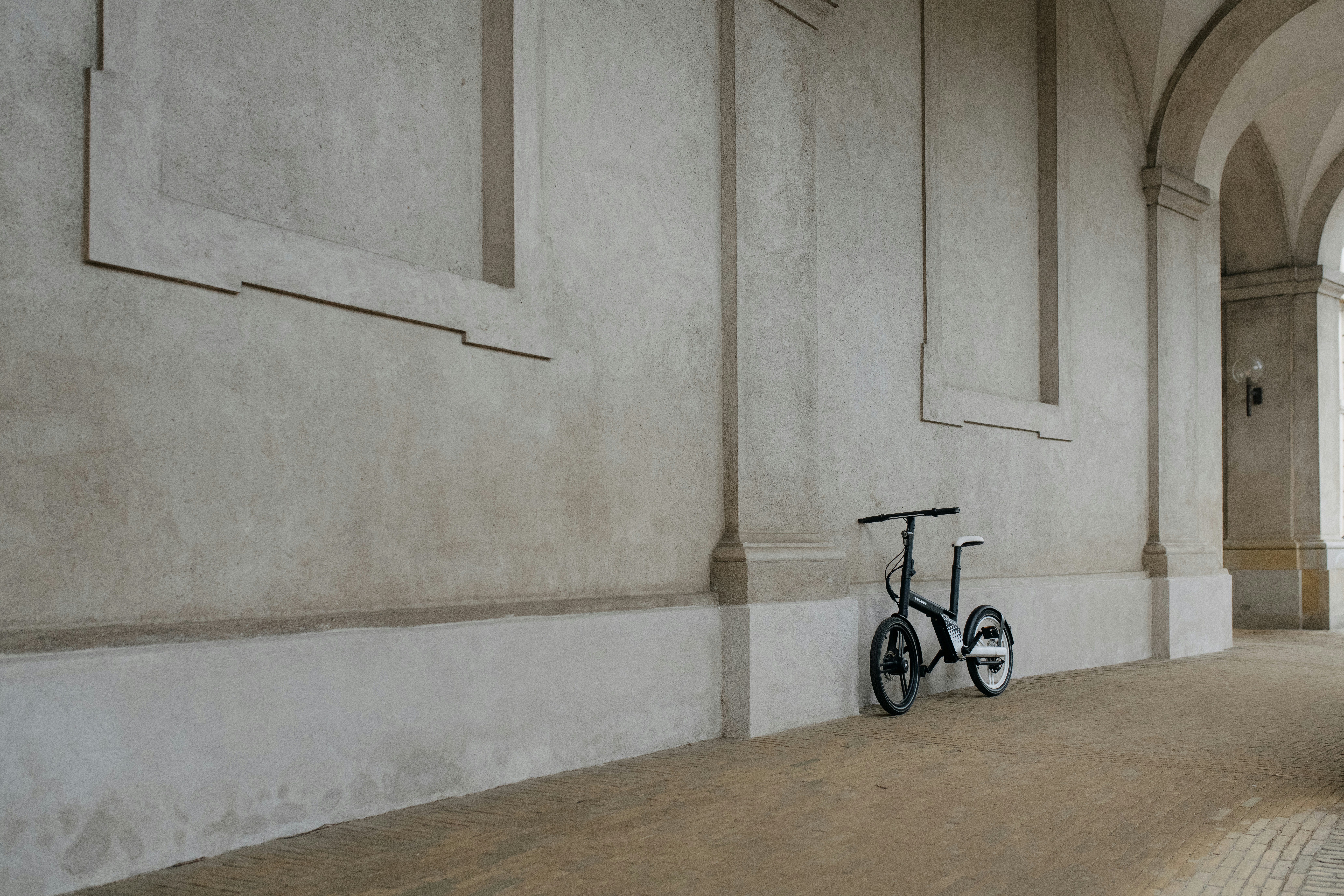 a bike parked in front of a building