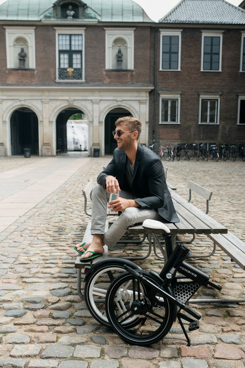 a man sitting on a bench